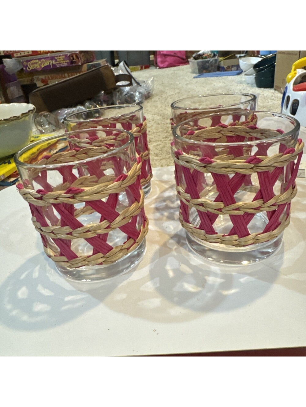 Set of 4 Pols Potten Reed glass tumbler pink and natural woven reed holder.